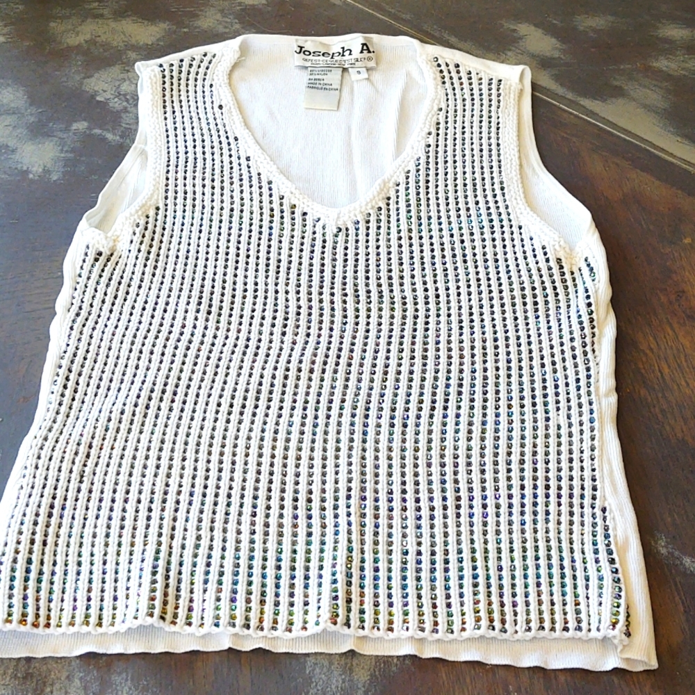 Joseph A sleeveless knit top with iridescent beads throughout the front. Size S